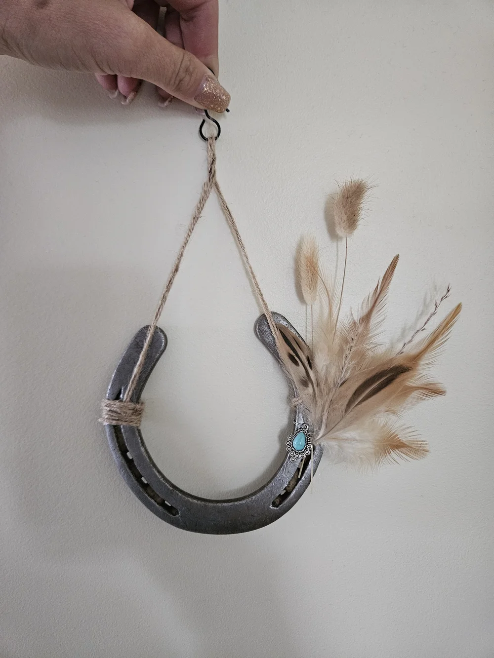 Rustic Silver Horseshoe Wall Hanging with Natural Feathers